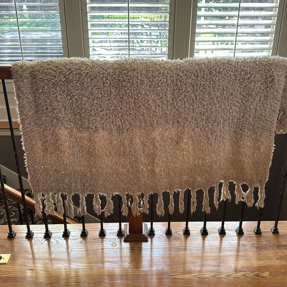 50”x 60” light loosely knit very soft light tan  afghan.